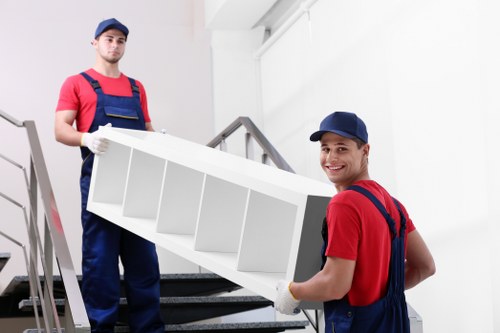 Removal team planning a flat move in Chiswick near local residential buildings