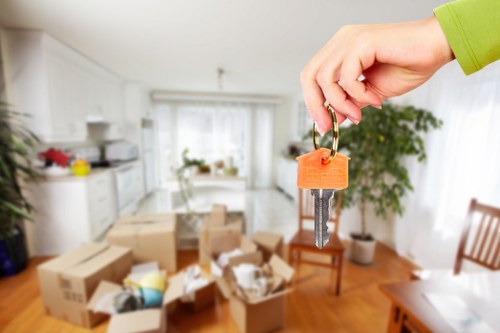 Moving staff handling items with care during a Chiswick removal