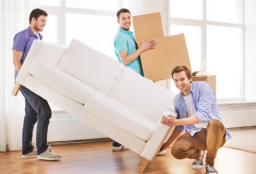 Moving van and removal crew in a Chiswick residential street