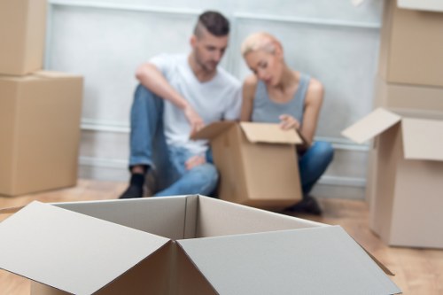 Professional mover handling furniture during transit