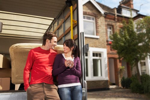 Careful wrapping and labelling of fragile household items during a Chiswick move